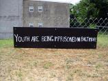 Garden sign: Youth are being imprisoned in Baltimore